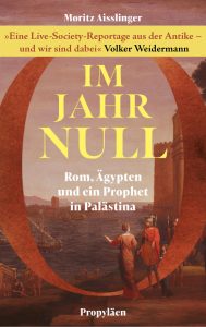 Cover von Im Jahr Null von Moritz Aisslinger: Hafen mit Segelschiffen, zwei in antiker Kleidung im Vordergrund, großer rostfarbener Ring.